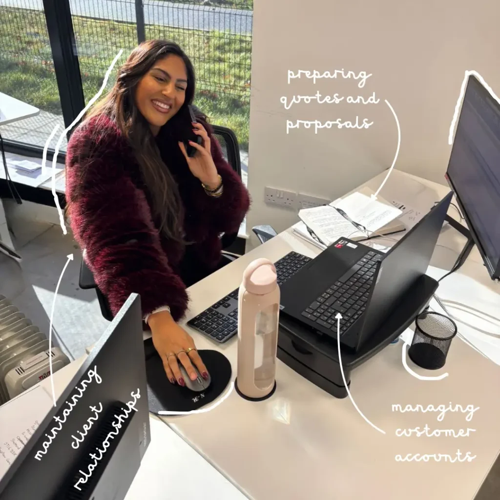 Rapid Energy's Internal Sales Executive, Jessica on the phone at her desk.