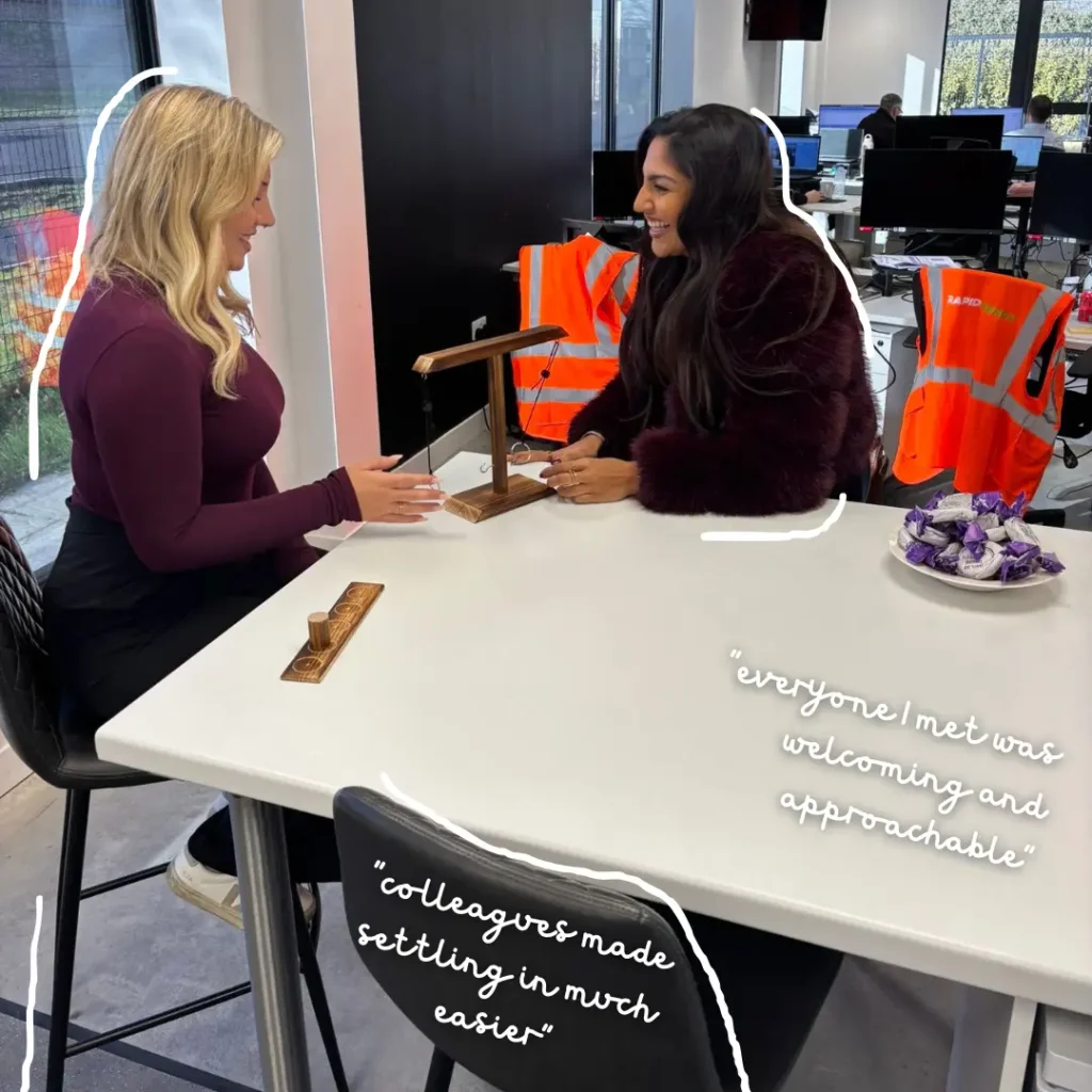 Rapid Energy's Internal Sales Executive, Jessica chatting with a colleague.